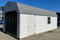 12x24 Vinyl Dutch Garage SALE NOW: $9,915 WAS $11,430 RTO 3 YR APPROX $487/month